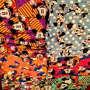 6 Pair of LulaRoe Disney tall and curvy leggings.